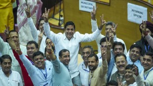 BJP candidate Sunder Singh Tanwar with other party councillors shows victory sign after the MCD's Standing Committee member election, at MCD House in New Delhi, Friday, Sept 27, 2024. (PTI Photo)
