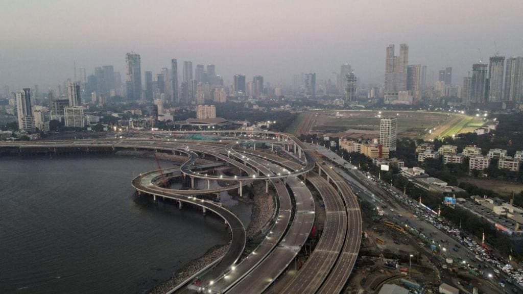Mumbai Road traffic congestion, ring roads Mumbai, Mumbai ring roads traffic, Versova-Bandra Sea Link, Mumbai traffic, Mumbai link road, MMRDA new road approval, Maharashtra govt, MMRDA elevated road, Eknath Shinde, Coastal Road, Mumbai Coastal Road project, coastal road Mumbai, Maharashtra news, Coastal Road construction, Maharashtra traffic, Mumbai Ring Road Masterplan, Mumbai Coastal Road, Mumbai Infrastructure Projects, Mumbai Traffic Congestion, Mumbai Urban Development, MMRDA (Mumbai Metropolitan Region Development Authority), Mumbai Ring Road Project, Mumbai Outer Ring Roads, Mumbai Inner Ring Roads, Mumbai Coastal Road Expansion, Mumbai Eastern Freeway, Mumbai Western Express Highway, Mumbai Sea Links, Mumbai Underwater Tunnels, Mumbai Flyovers, Mumbai Bridges, Mumbai Ring Road Project timeline, Mumbai Ring Road Project cost, Mumbai Ring Road Project benefits, Mumbai Ring Road Project impact on real estate, Mumbai Ring Road Project impact on public transport, Mumbai Ring Road Project impact on economic growth, Mumbai Metro, Mumbai Slum Redevelopment, Mumbai Urban Renewal, Mumbai Transportation Planning, Mumbai Traffic Solutions