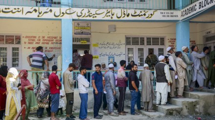 Voters stand in a queue to cast votes at a polling station during the first phase of Jammu and Kashmir Assembly elections, in Anantnag district of J&K, Wednesday, Sept. 18, 2024. (PTI Photo) Voters stand in a queue to cast votes at a polling station during the first phase of Jammu and Kashmir Assembly elections, in Anantnag district of J&K, Wednesday, Sept. 18, 2024. (PTI Photo)