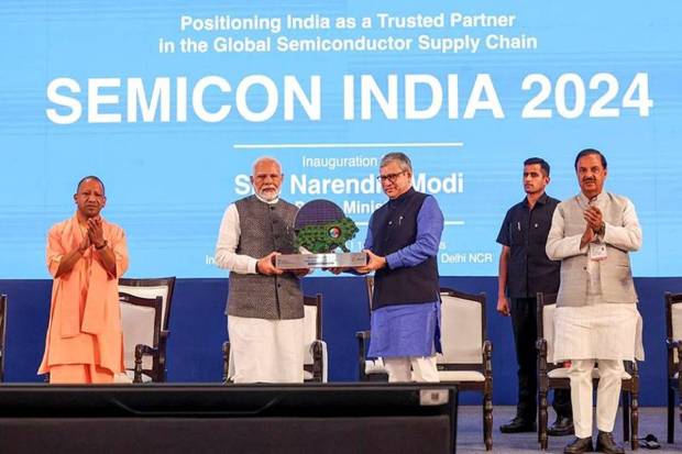 Prime Minister Narendra Modi, Union Minister of Electronics and Information Technology Ashwini Vaishnaw and Uttar Pradesh Chief Minister Yogi Adityanath during the inauguration of SEMICON India 2024, in Greater Noida, Uttar Pradesh on Wednesday, Sept 11, 2024. (Photo source: PTI)