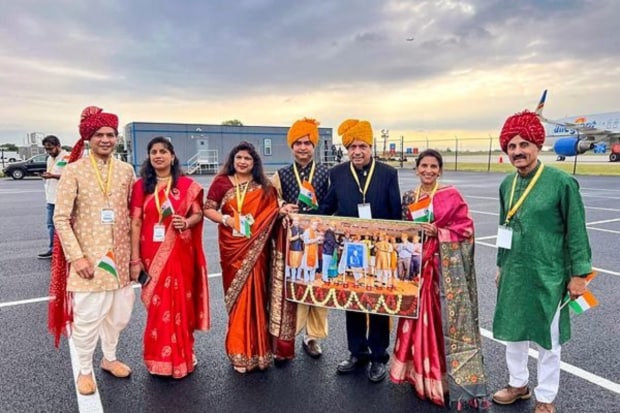 A group of Indian Americans at the Philadelphia airport to welcome Prime Minister Narendra Modi. (PTI Photo)