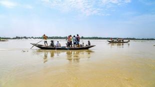 Nadia: People use boats to cross a flooded area at Santipur, in Nadia district, Sunday, Sept. 22, 2024. (PTI Photo)
