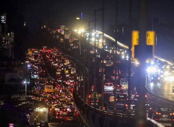 Vehicles packed in a traffic jam on a road after heavy rainfall, in Bengaluru, Karnataka on Tuesday, October. 15, 2024. (Photo source: PTI Photo)