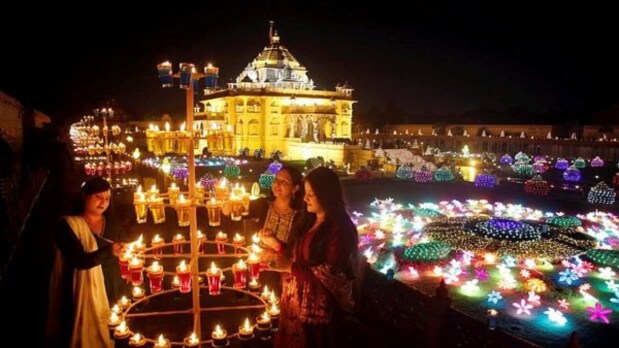 Gandhinagar: Devotees illuminate the Akshardham Temple premises with ‘diyas’ (earthen lamps) on the eve of the Diwali festival. (PTI)