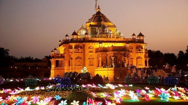 Gandhinagar: The Akshardham Temple premises glow brightly, illuminated for the Diwali festival on its eve in Gandhinagar. (PTI)