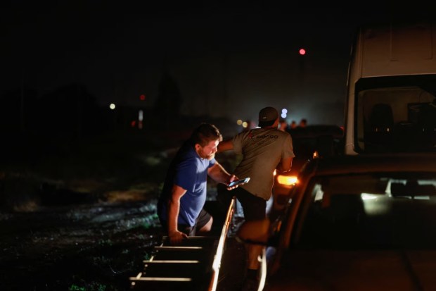 People fled in panic near Tel Aviv, Israel, on October 1, after Iran launched a barrage of ballistic missiles. (Reuters) 