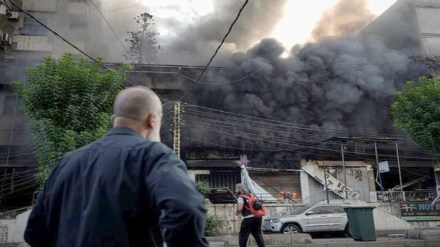 Flames and smoke rise from a destroyed building at the site of an Israeli airstrike in Dahiyeh, Beirut, Lebanon, Sunday, Oct. 6, 2024. (AP Photo/Bilal Hussein)