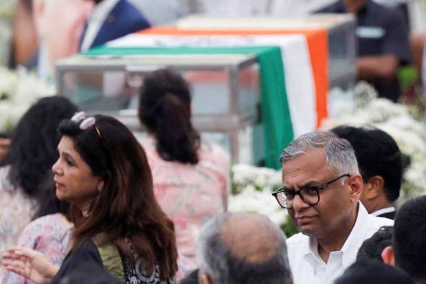 Tata Sons Chairman N Chandrasekaran with others while paying homage to business leader Ratan Tata at NCPA lawns. (Photo source: Reuters)