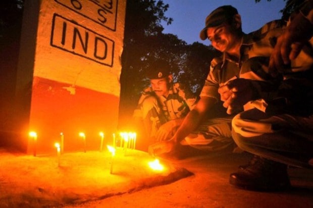 BSF jawans illuminate the night with candles in Agartala, near the Indo-Bangladesh border: PTI