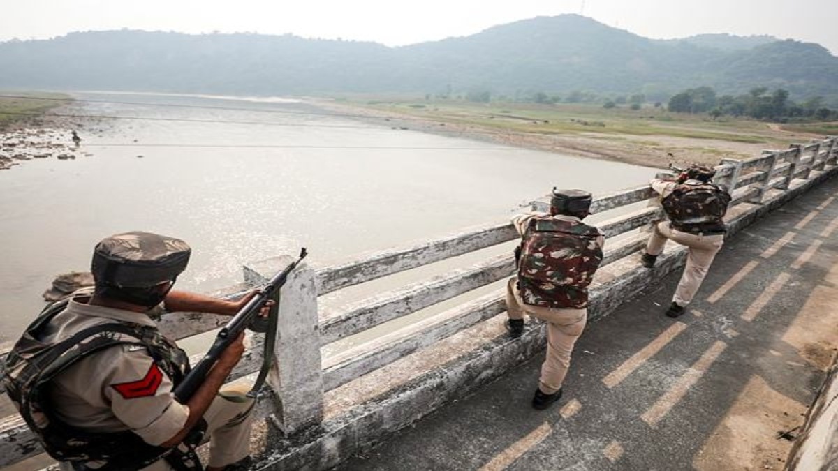 Akhnoor: Police personnel stand guard during a search operation after a terror attack in Batal area of Akhnoor Sector, J & K, Monday, Oct. 28, 2024. (PTI Photo)