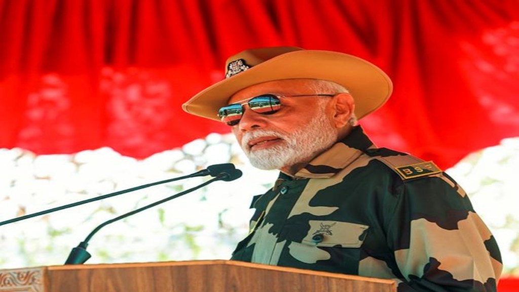 Prime Minister Narendra Modi addresses during Diwali celebration with BSF jawans at Lakki Nala in Sir Creek area in Kutch, Gujarat. (PTI Photo) Prime Minister Narendra Modi addresses during Diwali celebration with BSF jawans at Lakki Nala in Sir Creek area in Kutch, Gujarat. (PTI Photo)