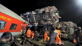 NDRF personnel at the spot after an express train rammed into a stationary train, at Kavaraipettai in Tiruvallur district, Friday night, Oct. 11, 2024. (PTI Photo/R Senthilkumar)