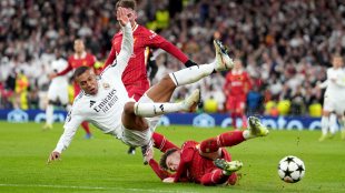 Liverpool's Conor Bradley tackles Real Madrid's Kylian Mbappe (left) during the Champions League at Anfield Stadium, Liverpool, England (ap/pti)