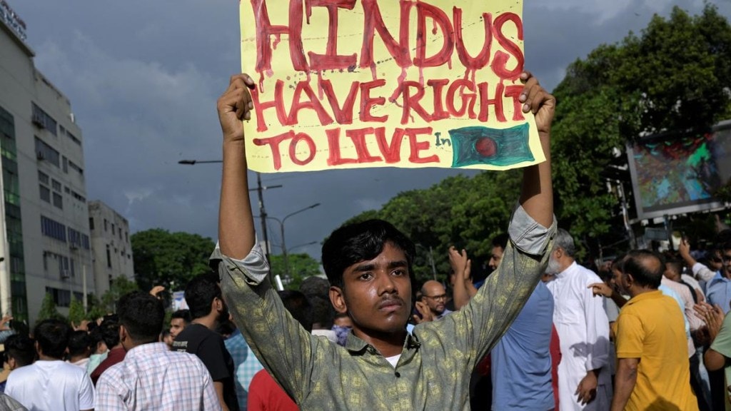 A demonstrator displays a placard during a protest , in Dhaka, Bangladesh, on August 9, 2024. Representational Photo/(Image Source: Reuters) A demonstrator displays a placard during a protest , in Dhaka, Bangladesh, on August 9, 2024. Representational Photo/(Image Source: Reuters)