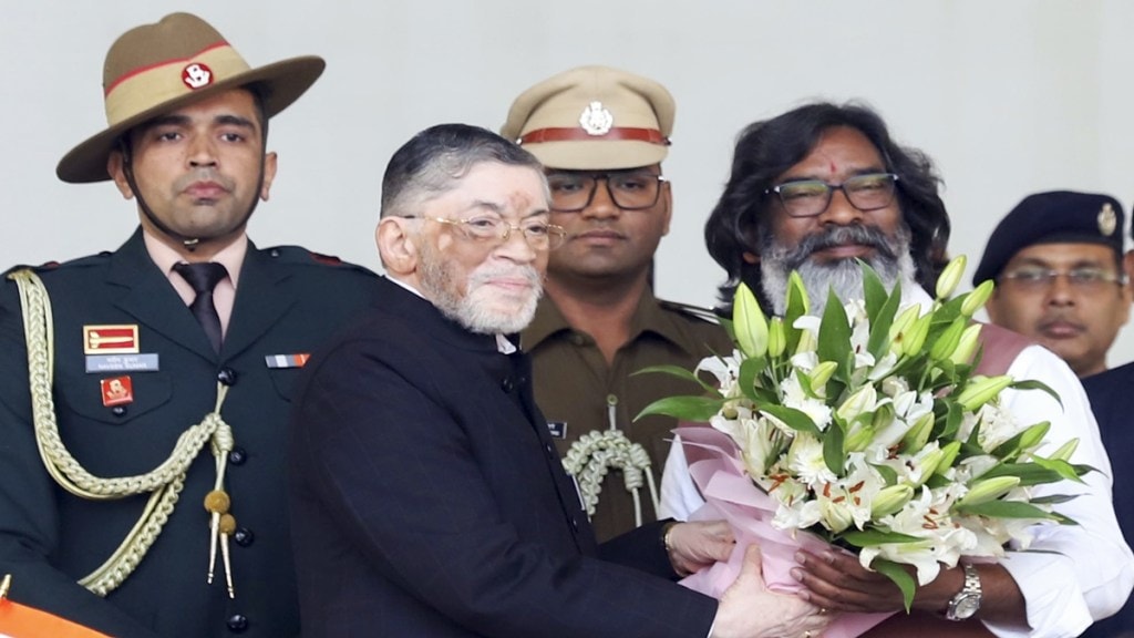 Jharkhand Governor Santosh Gangwar greets newly sworn-in Chief Chief Minister Hemant Soren at the oath ceremony, in Ranchi, Thursday, Nov. 28, 2024. (PTI Photo) Jharkhand Governor Santosh Gangwar greets newly sworn-in Chief Chief Minister Hemant Soren at the oath ceremony, in Ranchi, Thursday, Nov. 28, 2024. (PTI Photo)
