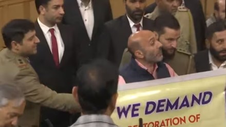 Ruckus in J&K Assembly as Engineer Rashid's brother displays Article 370 banner, BJP clashes with NC