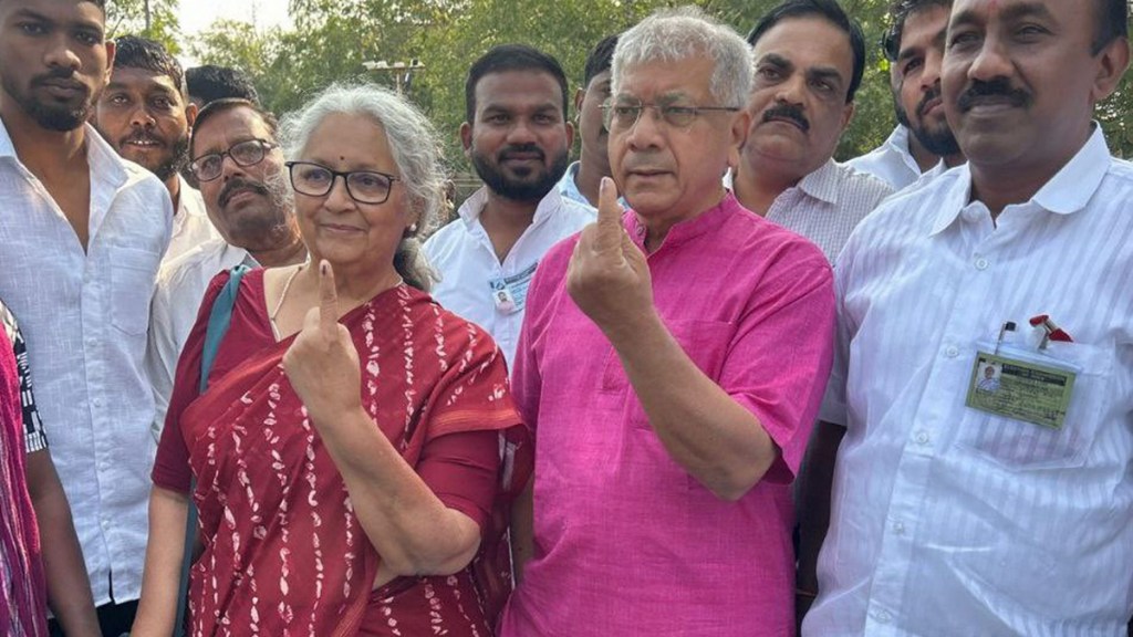Vanchit Bahujan Aaghadi President Prakash Ambedkar and his wife show their fingers marked with indelible ink after casting votes during the Maharashtra Assembly elections, in Akola district, Wednesday, Nov. 20, 2024. (PTI Photo) Vanchit Bahujan Aaghadi President Prakash Ambedkar and his wife show their fingers marked with indelible ink after casting votes during the Maharashtra Assembly elections, in Akola district, Wednesday, Nov. 20, 2024. (PTI Photo)