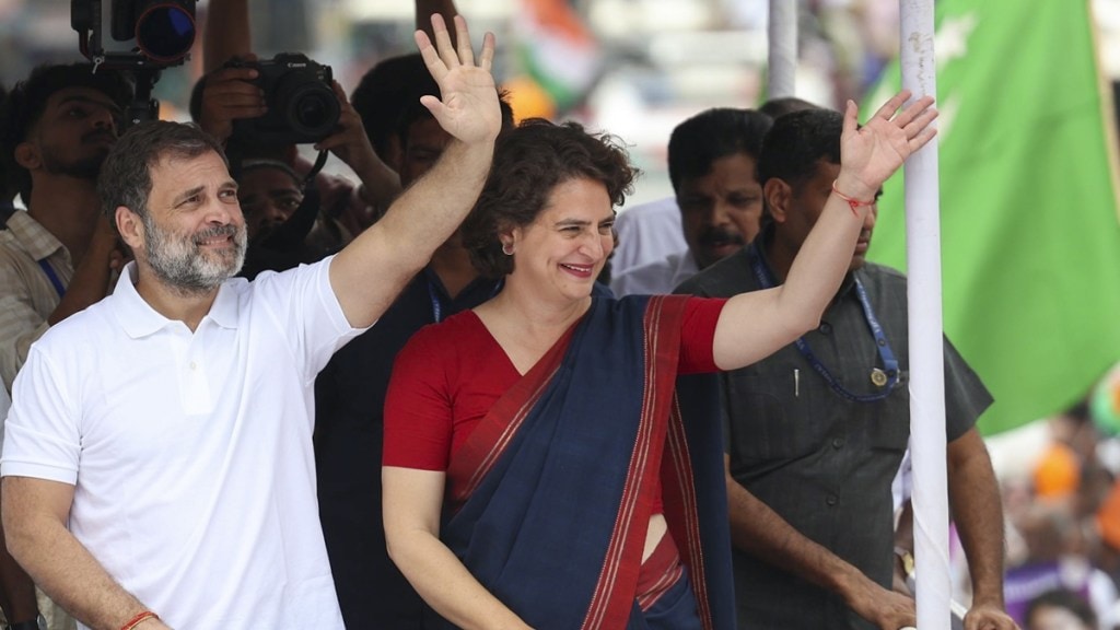 Wayanad (Kerala) Bypoll Voting HIghlights: Congress leader Rahul Gandhi with his sister and party candidate Priyanka Gandhi Vadra during a roadshow for Wayanad Lok Sabha seat by-polls, at Sulthan Bathery area, in Wayanad district, Kerala, Monday, Nov. 11, 2024. (PTI Photo)