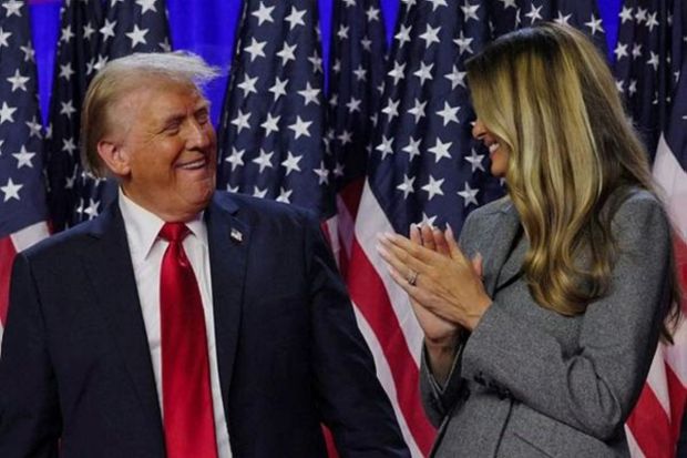 Former US President Donald Trump, left, and former US First Lady Melania Trump during an election night event at the Palm Beach Convention Center in West Palm Beach, Florida, US, on Wednesday, Nov. 6, 2024. (Eva Marie Uzcategui/Bloomberg)