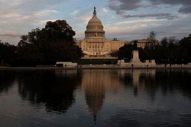 The sun sets on the U.S. Capitol building as seen from the Capitol Reflecting Pool the day U.S. President Elect Donald Trump was declared the winner of the presidential election in Washington, U.S., November 6, 2024. (REUTERS/Leah Millis)