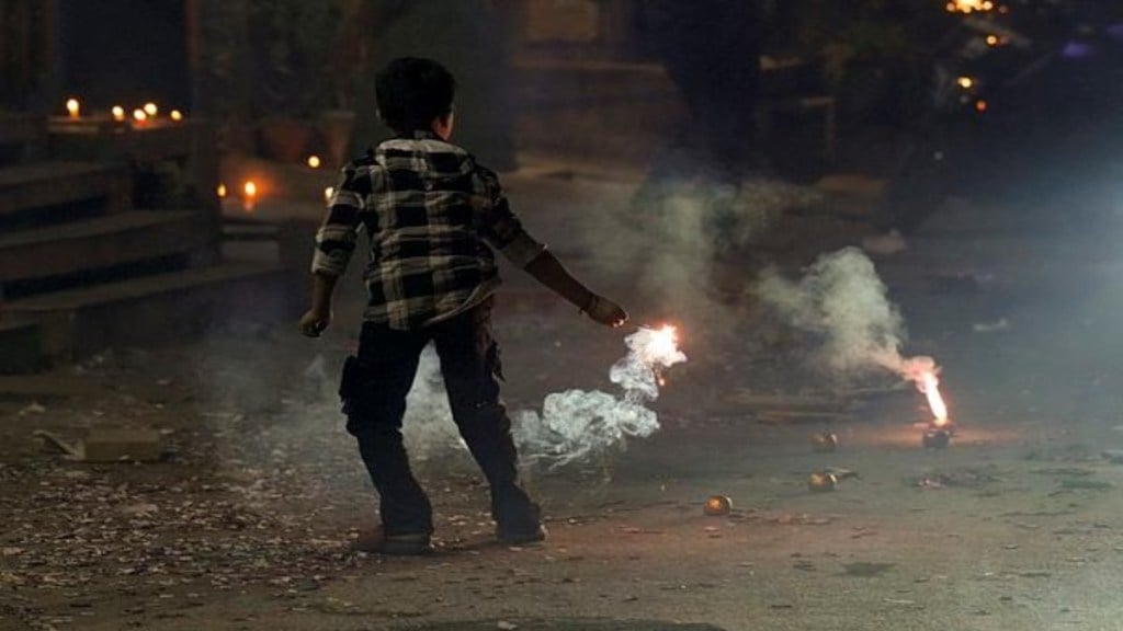 A child bursts firecrackers during celebration of the ‘Diwali’ festival, in New Delhi, Thursday, Oct. 31, 2024. (PTI Photo/Manvender Vashist Lav) A child bursts firecrackers during celebration of the ‘Diwali’ festival, in New Delhi, Thursday, Oct. 31, 2024. (PTI Photo/Manvender Vashist Lav)