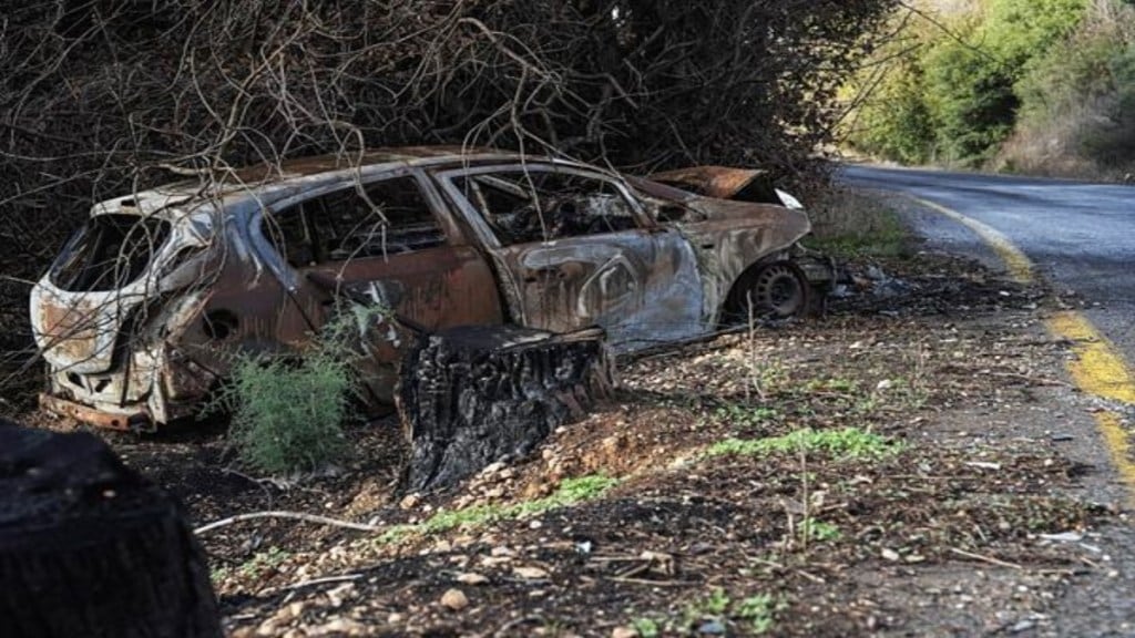 A burnt car is seen at the side of a road near the Israeli border with Lebanon, amid cross-border hostilities between Hezbollah and Israel, in northern Israel , November 25, 2024. REUTERS A burnt car is seen at the side of a road near the Israeli border with Lebanon, amid cross-border hostilities between Hezbollah and Israel, in northern Israel , November 25, 2024. REUTERS