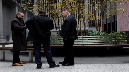 Law enforcement officers work near the scene where the CEO of United Healthcare Brian Thompson was reportedly shot and killed in Midtown Manhattan, in New York City, US, December 4, 2024.REUTERS/Shannon Stapleton