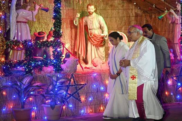 West Bengal Chief Minister Mamata Banerjee during midnight prayers at a church to celebrate Christmas, in Kolkata. (Photo source: PTI)
