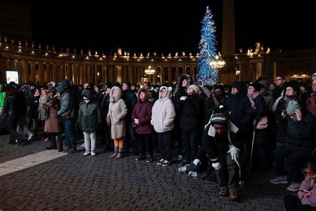 People attend a mass from St. Peter's Square to mark the opening of the 2025 Catholic Holy Year, or Jubilee, at the Vatican. (Photo source: Reuters)