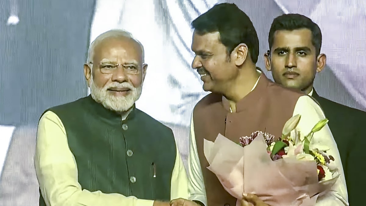 Prime Minister Narendra Modi with BJP leader Devendra Fadnavis during the latter's swearing-in ceremony as Maharashtra Chief Minister, in Mumbai, Thursday, Dec. 5, 2024. (PTI Photo)