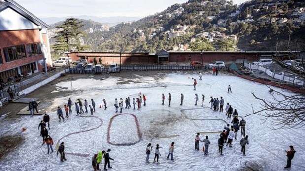 Tourists during celebrations of New Year 2025, at Lakkar Bazar in Shimla (PTI)