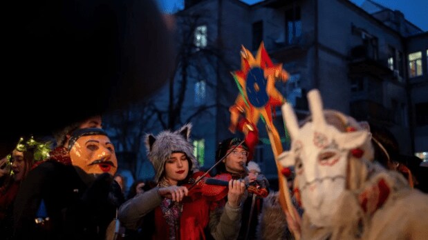 Kyiv: Revelers play folk music and wear traditional costumes designed to ward off evil spirits and bring good fortune during a Malanka Ukrainian folk celebration amid Russia’s invasion, in Kyiv, Ukraine. (REUTERS)