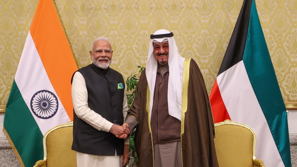 Kuwait's Crown Prince Sheikh Sabah Khaled Al-Hamad Al-Sabah shakes hands with India's Prime Minister Narendra Modi in Kuwait City, Kuwait, December 22, 2024.