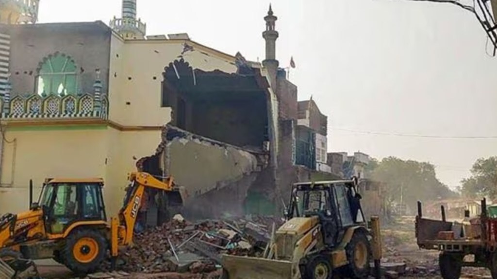 Bulldozers being used by the Fatehpur district administration in Uttar Pradesh to demolish an allegedly encroached part of the Noori Jama Masjid after the mosque committee failed to remove the encroachment despite two official notices, in Fatehpur. (PTI Photo)