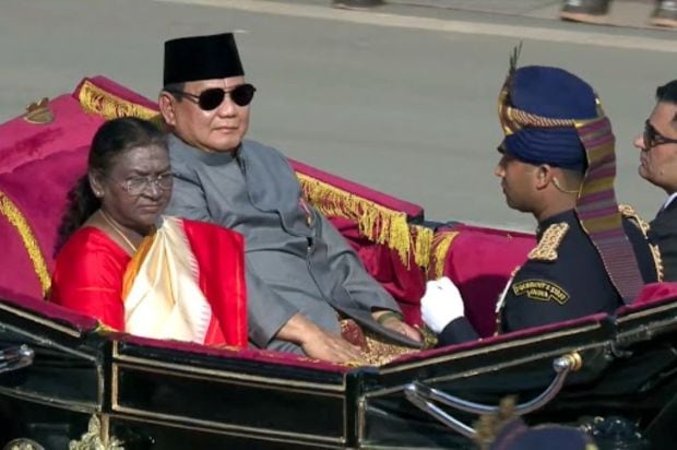 R-Day Chief Guest and Indonesian President Prabowo Subianto's arrival in a buggy to attend India's 76th Republic Day parade at Kartavya Path, in New Delhi on January 26, 2025. (Image: @PresidentOfIndia via PTI Photo)