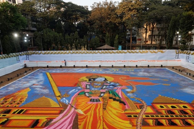 A rangoli featuring the Hindu deity Lord Ram and the Ram Temple was created in Ahmedabad to celebrate the opening of the Lord Ram temple in the northern town of Ayodhya. (Image Source: Reuters)