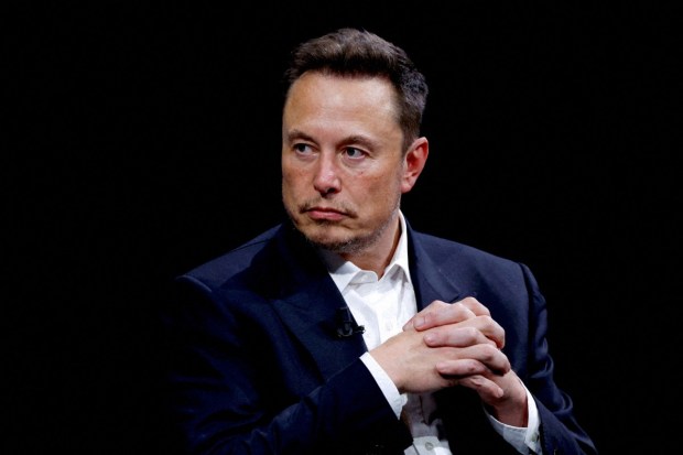 Elon Musk is the richest person with a net worth of $433.9 billion, primarily from Tesla and SpaceX. (Image Source: Reuters)