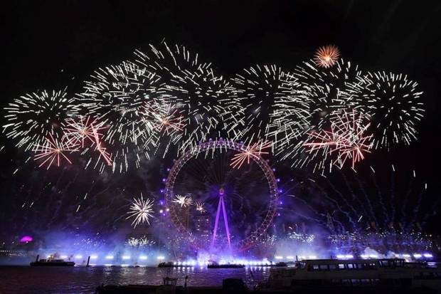 Fireworks explode over the London Eye Ferris wheel as Britons across the country welcome the New Year, in London, Britain, January 1, 2025. (Photo source: Reuters)