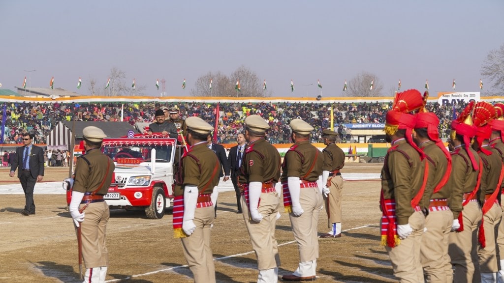 Jammu and Kashmir Deputy CM Surinder Choudhary reviews parade on the Republic Day, in Srinagar, Sunday, Jan. 26, 2025. (PTI Photo/S Irfan)