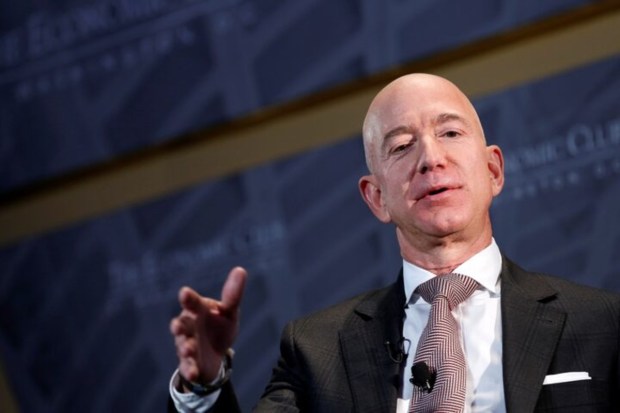 Jeff Bezos comes in second with a net worth of $239.4 billion, built from Amazon. (Image Source: Reuters)