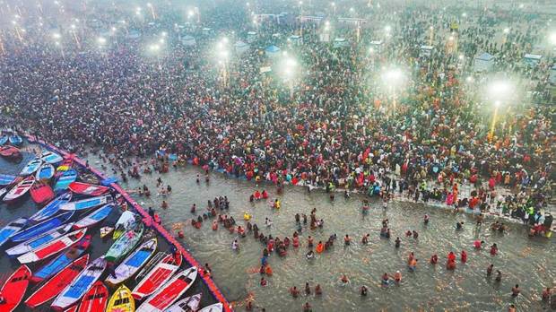 Devotees take a holy dip at Sangam during Maha Kumbh Mela 2025, in Prayagraj, Uttar Pradesh on January 13, 2024. (Photo source: PTI)