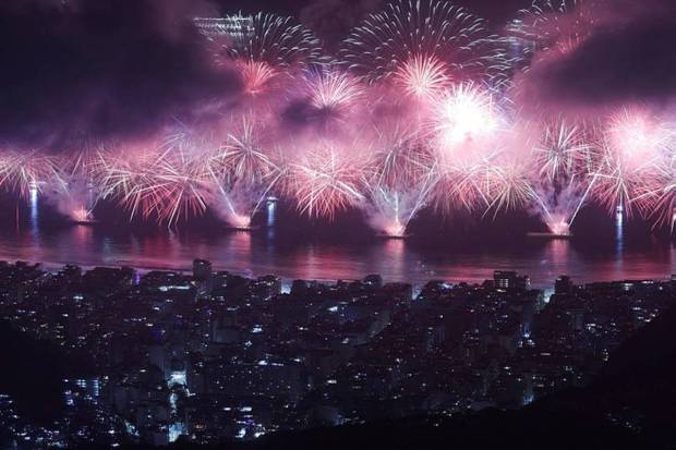 Fireworks explode over Copacabana beach to celebrate the New Year in Rio de Janeiro, Brazil. (Photo source: Reuters)