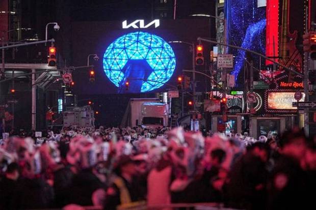 People gather at Times Square to watch the ball drop on New Year's Eve in New York City, US. (Photo source: Reuters)