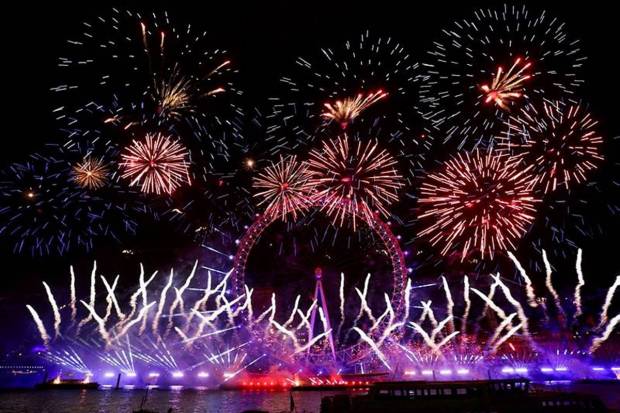 Fireworks light up the sky around the London Eye on the south bank of the River Thames to celebrate the New Year in London, Wednesday, Jan. 1, 2025. (Photo source: AP)