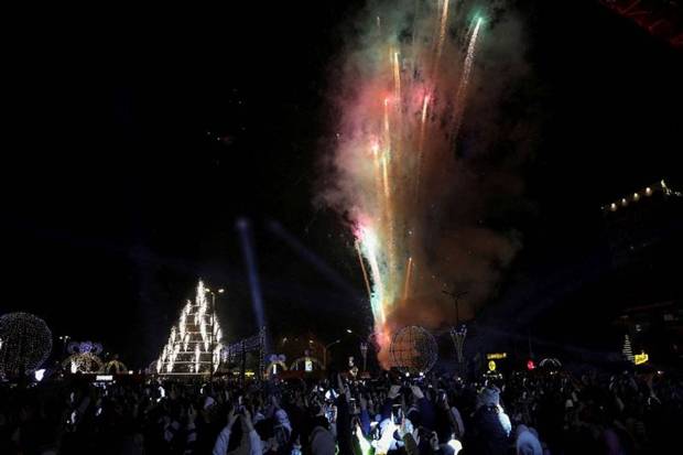 People gather during New Year's celebrations as they watch fireworks, after the ousting of Syria's Bashar al-Assad, in Damascus, Syria. (Photo source: Reuters)