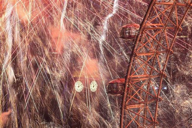 Fireworks explode over Big Ben and the London Eye to mark the New Year's celebrations, in London, Britain. (Photo source: Reuters)