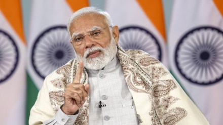 Prime Minister Narendra Modi speaks during distribution of property cards under 'Svamitva' scheme, across 10 states and two Union Territories, via video conferencing. (PMO via PTI Photo) Prime Minister Narendra Modi speaks during distribution of property cards under 'Svamitva' scheme, across 10 states and two Union Territories, via video conferencing. (PMO via PTI Photo)
