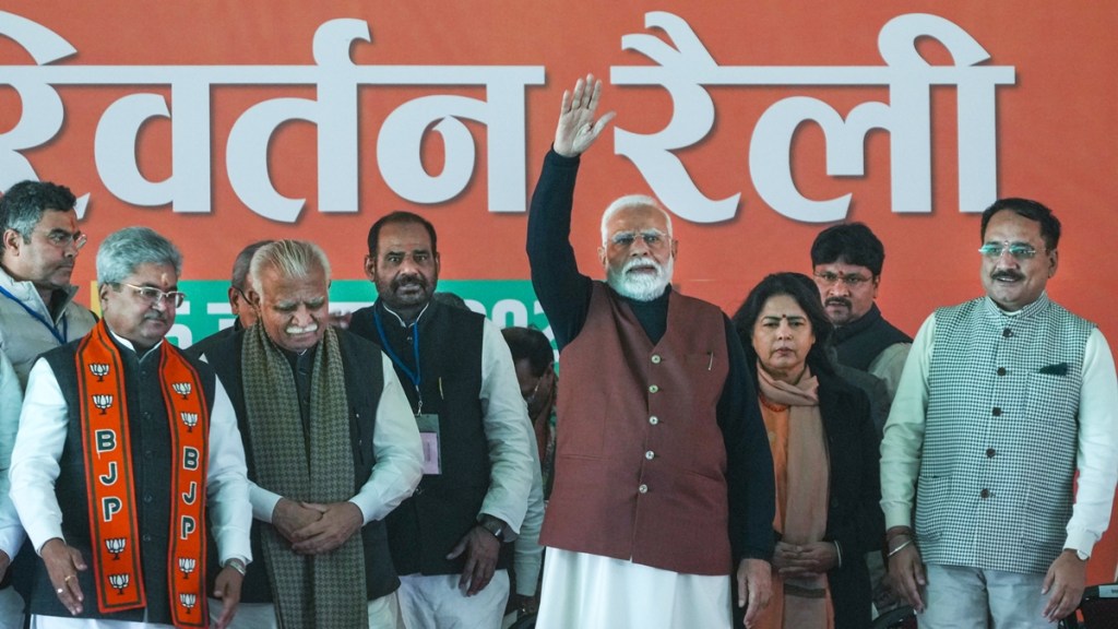 Prime Minister Narendra Modi with Union Minister Manohar Lal, BJP National General Secretary Dushyant Kumar Gautam, Delhi BJP President Virendra Sachdeva and BJP candidate for Delhi Assembly elections Ramesh Bidhuri during a public meeting, at Rohini, in New Delhi, Sunday, Jan. 5, 2025. (PTI Photo)