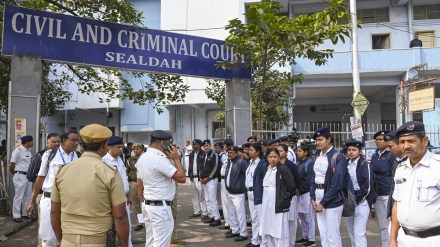 Police personnel keep vigil outside the Sealdah court where the judgement in the alleged rape and murder of an on-duty doctor at R G Kar Medical College and Hospital is scheduled to be delivered, in Kolkata, Saturday, Jan. 18, 2025. (PTI Photo)