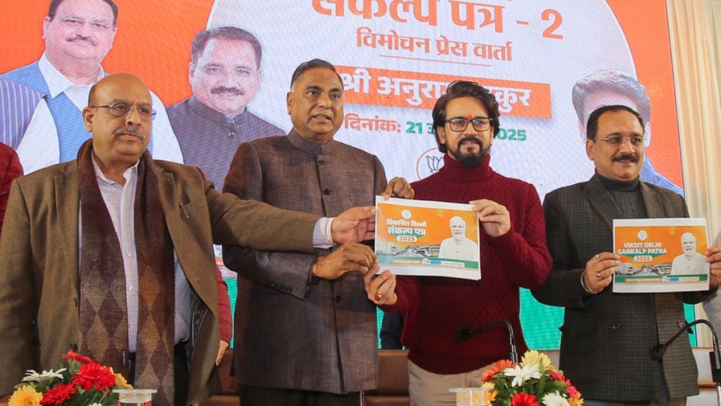 JP MPs Anurag Thakur and Ramvir Singh Bidhuri with Delhi party President Virendra Sachdeva, and party leader Vijender Gupta during the launch of the second part of the party's 'Sankalp Patra' (manifesto). (Image Source: PTI) JP MPs Anurag Thakur and Ramvir Singh Bidhuri with Delhi party President Virendra Sachdeva, and party leader Vijender Gupta during the launch of the second part of the party's 'Sankalp Patra' (manifesto). (Image Source: PTI)